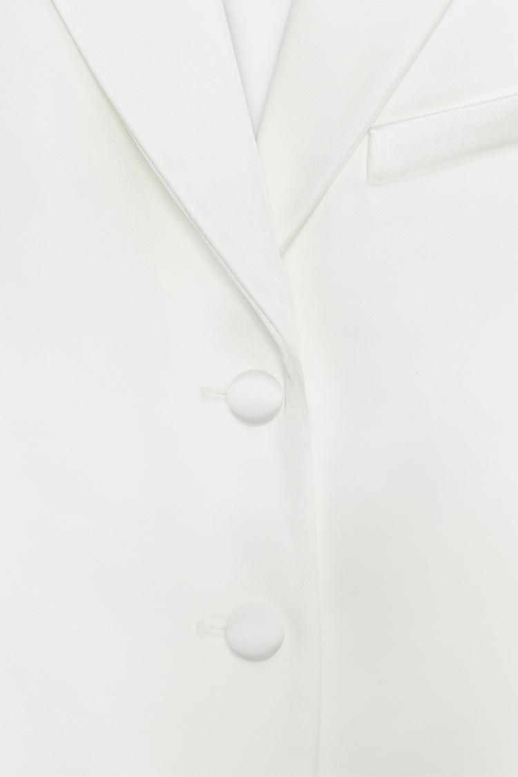 a KEYLA Satin Crop Blazer