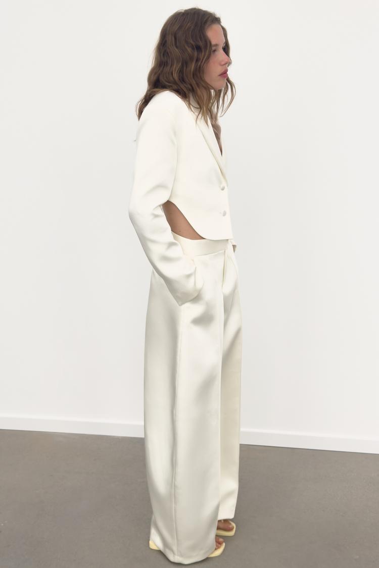a KEYLA Satin Crop Blazer