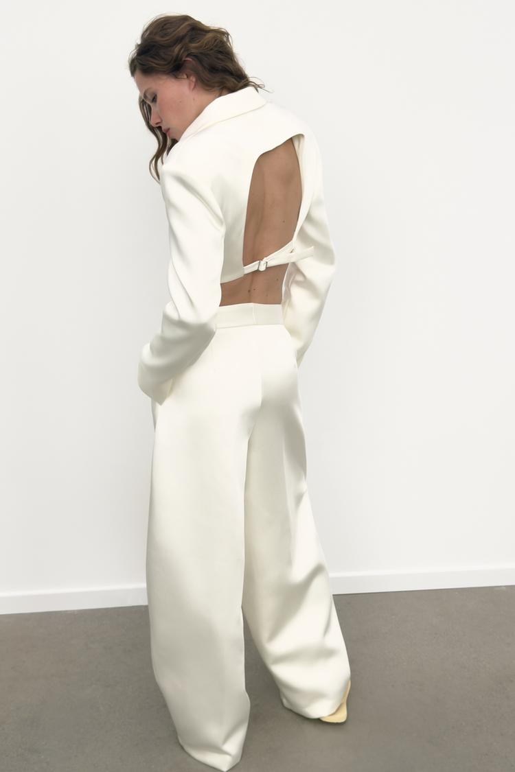 a KEYLA Satin Crop Blazer