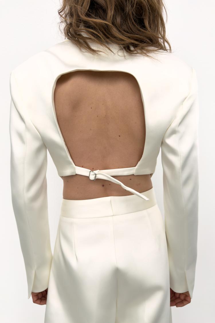 a KEYLA Satin Crop Blazer