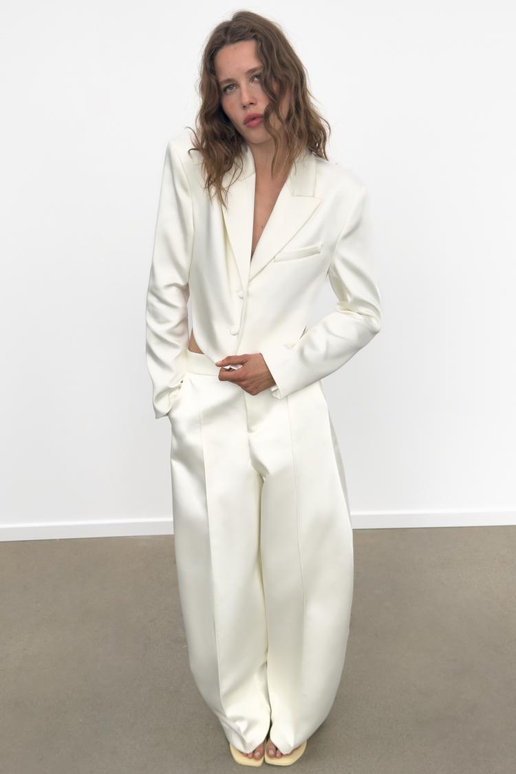 a KEYLA Satin Crop Blazer
