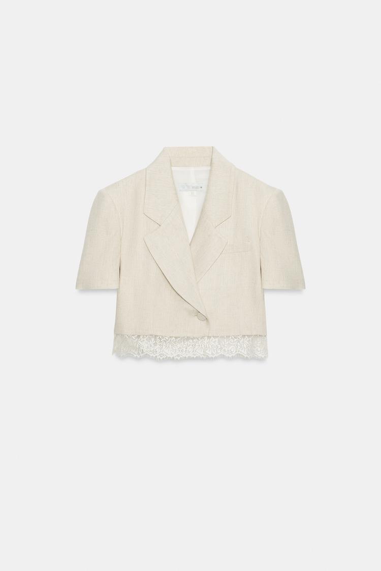 a MEGAN Short Lace Blazer
