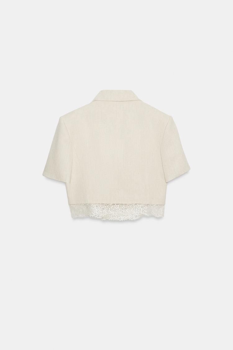 a MEGAN Short Lace Blazer
