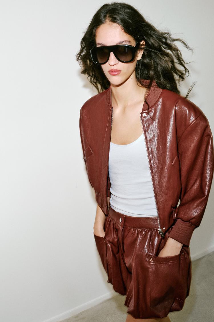 A MELBOURNE Faux Leather Balloon Mini Skirt