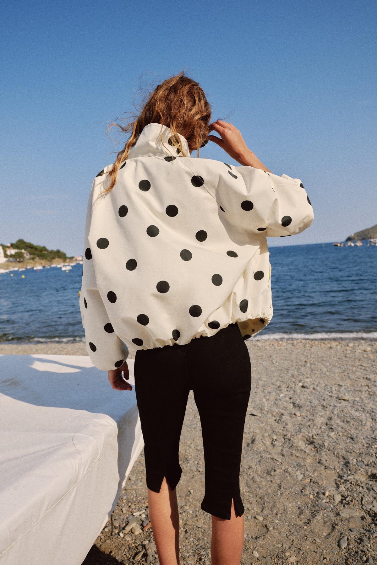 a ARIKA POLKA DOT BOMBER JACKET