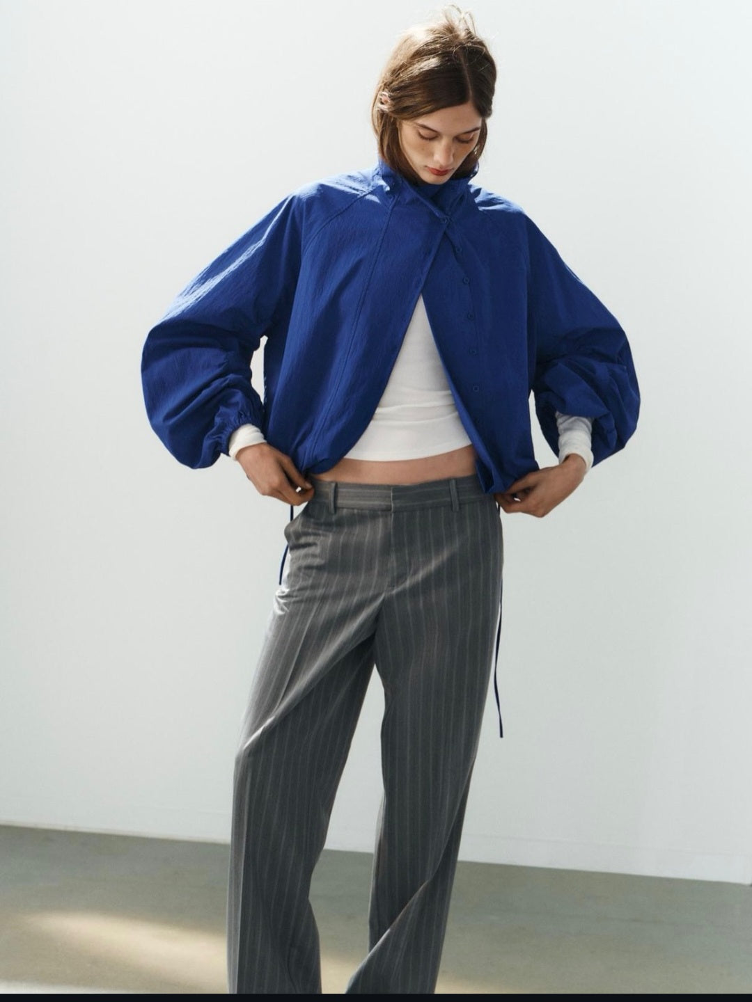a BOMBER JACKET BLUISH