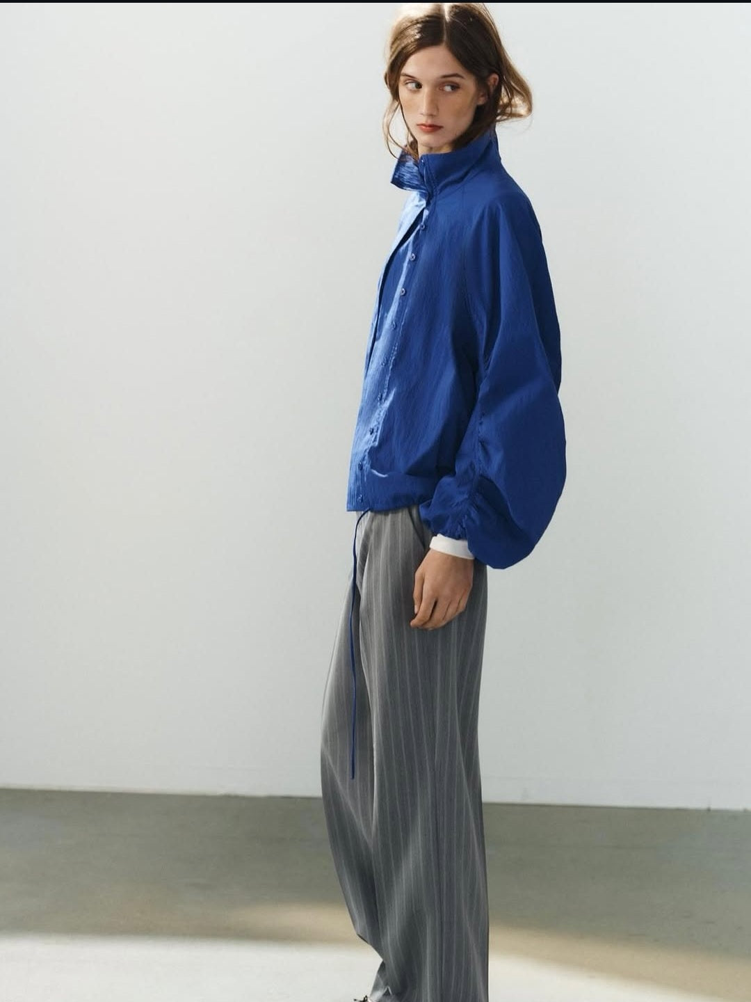 a BOMBER JACKET BLUISH