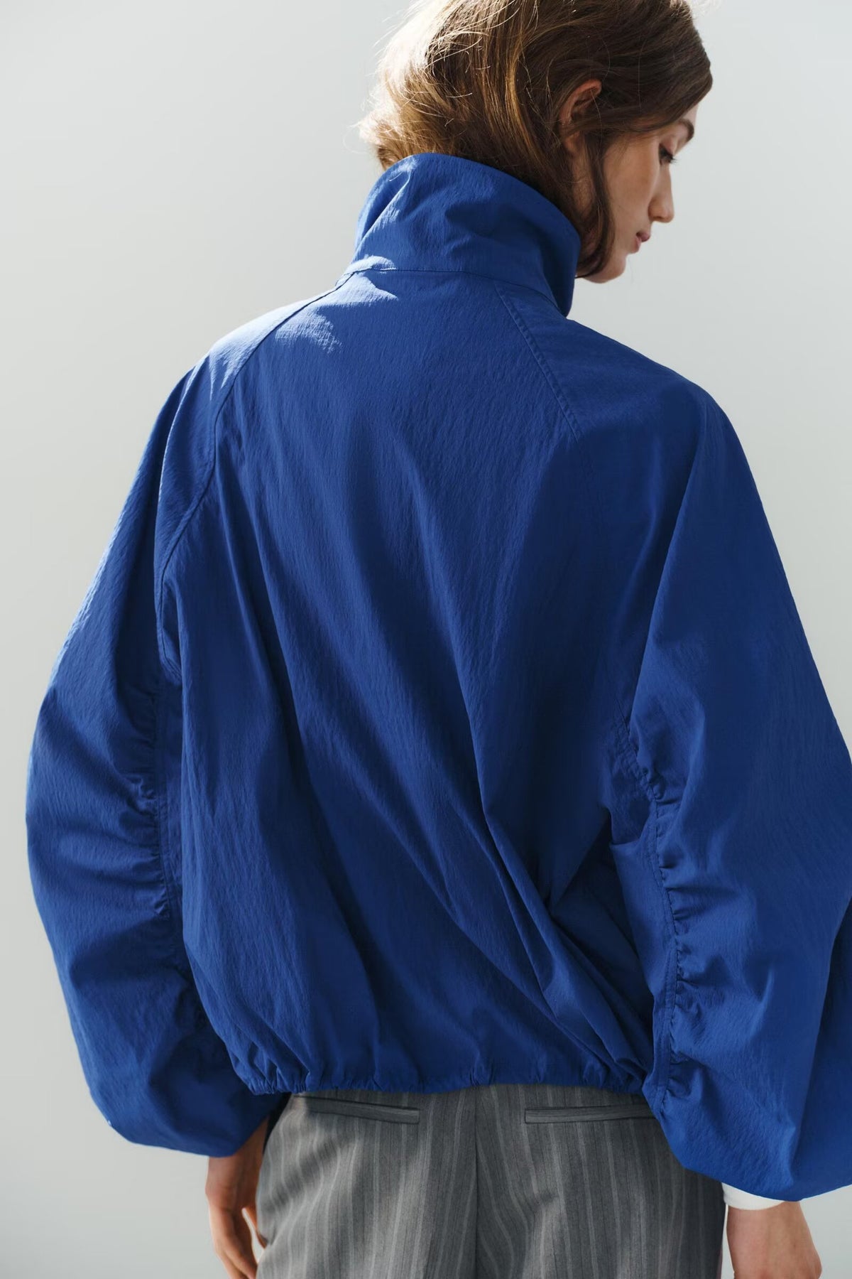 a BOMBER JACKET BLUISH